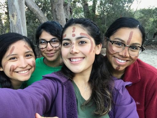Loop Abroad students posing with their aboriginal painted faces.