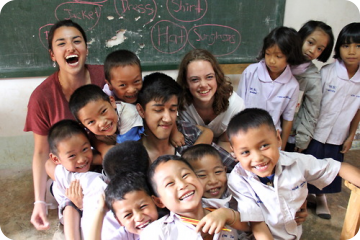 Student with the children at school