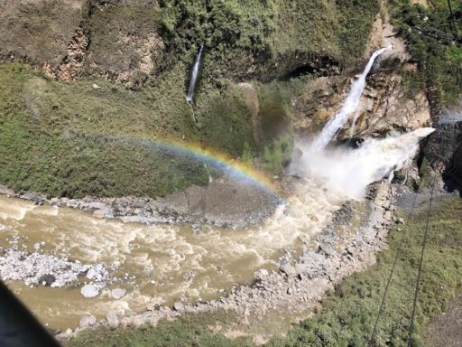 Beautiful rainbow on top of a water falls