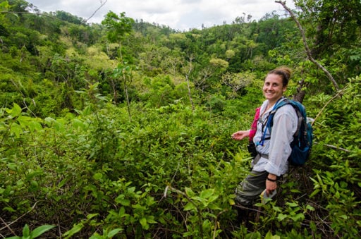 Loop Abroad student pose in a shrubby location 